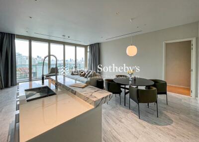 Modern combined living and dining area with panoramic city views