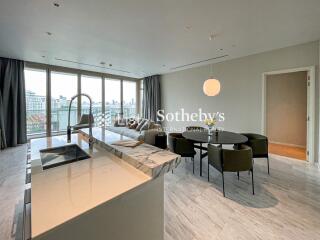 Modern combined living and dining area with panoramic city views