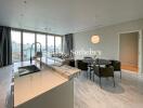 Modern combined living and dining area with panoramic city views