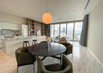 Modern kitchen and dining area with city view