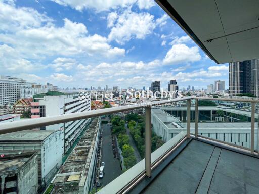 City view from a high-rise building balcony