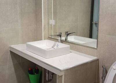 Modern bathroom with large mirror and sink