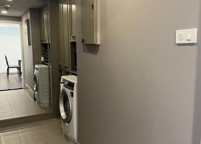 Utility area with washer and dryer