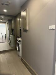 Utility area with washer and dryer