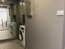 Utility area with washer and dryer