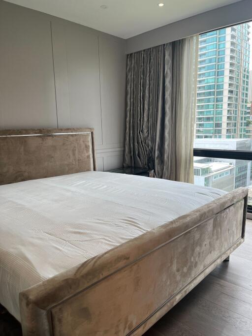 Bedroom with bed and city view