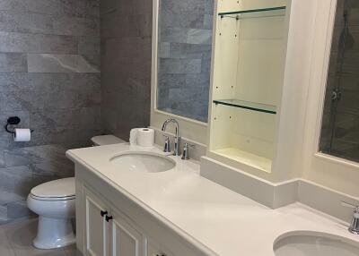 Modern bathroom with double sink and large mirror