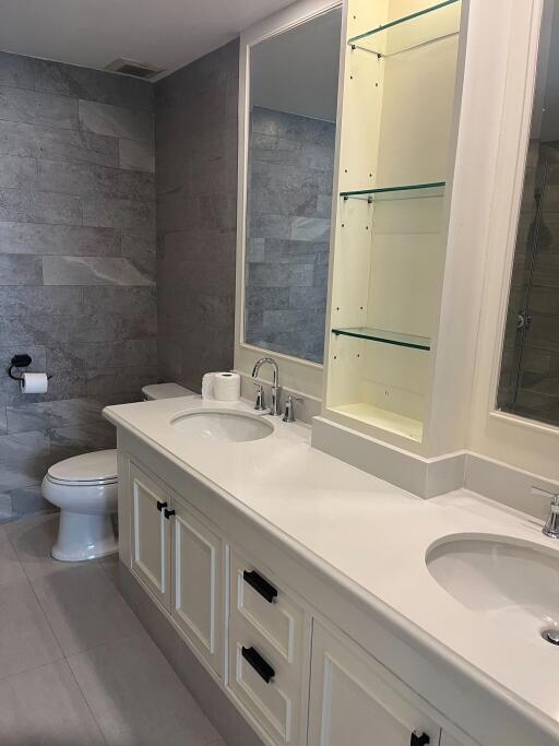 Modern bathroom with double sink and large mirror