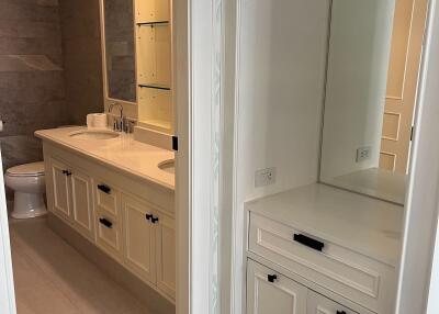 Bathroom with double sink and vanity area