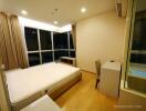 Modern bedroom with large windows and night view