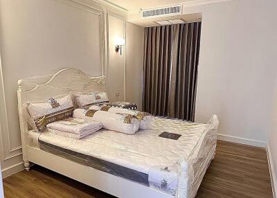 Newly furnished bedroom with bed