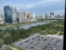 View of the city skyline and river from high-rise window