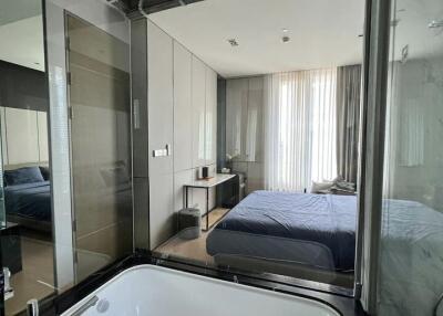 Modern bedroom view from ensuite bathroom