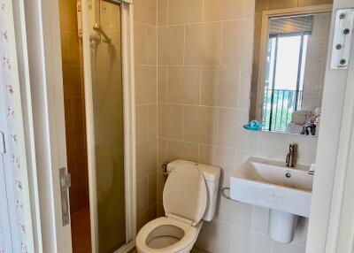 Bathroom with shower, toilet, and sink