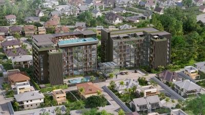 Aerial view of modern residential complex with swimming pool and surrounding neighborhood