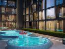 Modern condominium building with a stylish outdoor pool area