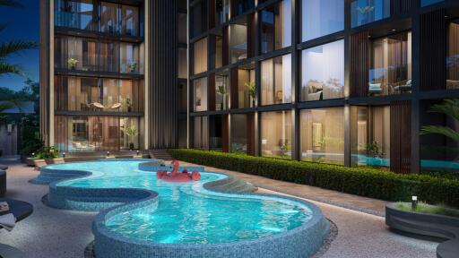 Modern condominium building with a stylish outdoor pool area