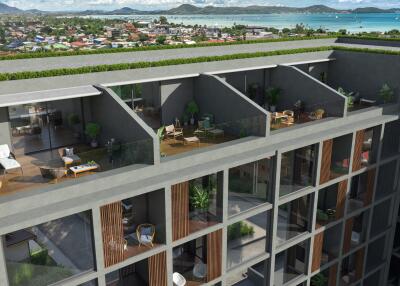 Modern building with rooftop terraces and sea view