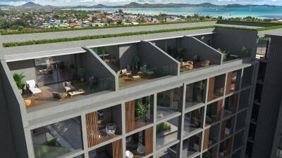 Modern building with rooftop terraces and sea view