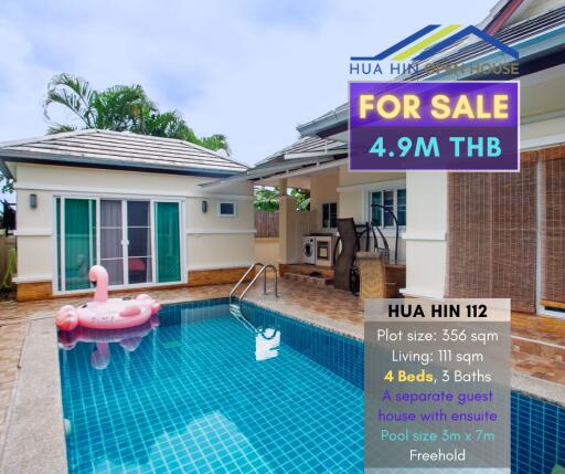 House with swimming pool and for sale sign