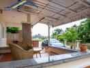 Outdoor patio with seating area and driveway