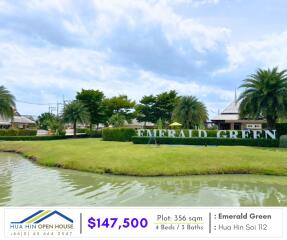 View of Emerald Green residential area facade with landscaped garden and water feature