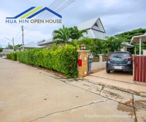 Front view of modern house with driveway