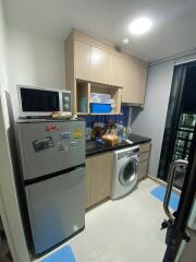 Modern compact kitchen with appliances