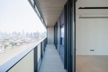 Long balcony corridor with cityscape view