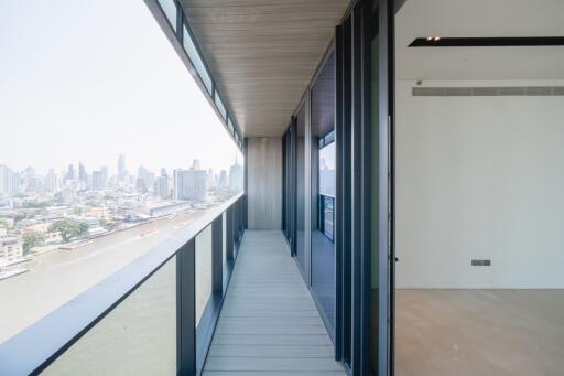 Long balcony corridor with cityscape view