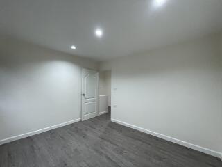 empty room with recessed lighting