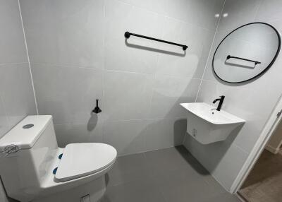 Modern bathroom with a toilet and a sink