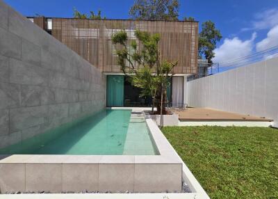 Modern house with swimming pool and patio