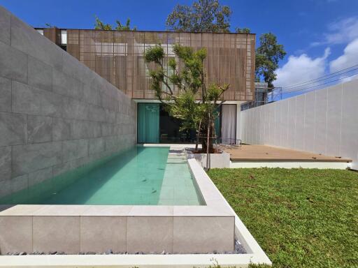 Modern house with swimming pool and patio