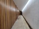 Modern hallway with wooden paneling and lighting