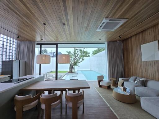 Spacious living room with pool view