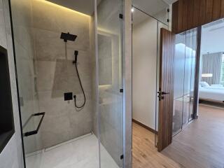 Modern bathroom with glass shower enclosure