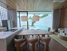 Modern kitchen and dining area with a view of the swimming pool