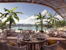 Outdoor dining area with lake view