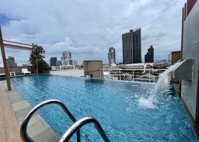 Rooftop swimming pool with cityscape view