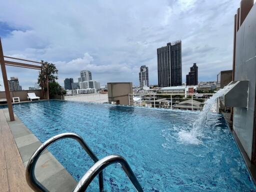 Rooftop swimming pool with cityscape view