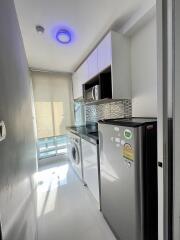 Modern compact kitchen with appliances