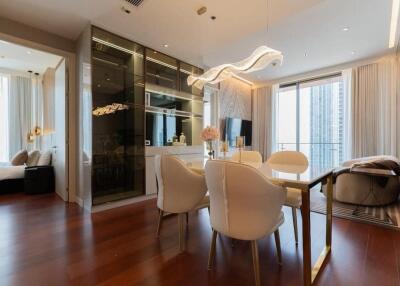 Modern living room and dining area with large windows