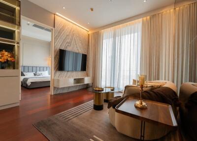 Modern living room with a view into the bedroom