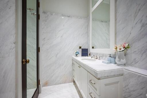 Elegant Bathroom with Marble Finish