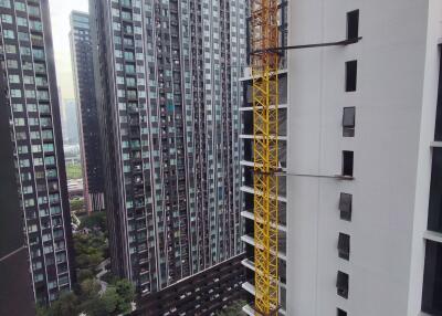 View of high-rise buildings with a construction crane