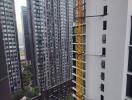 View of high-rise buildings with a construction crane