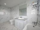 Modern bathroom with white marble tiles