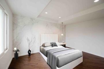 Modern bedroom with a large bed and stylish decoration