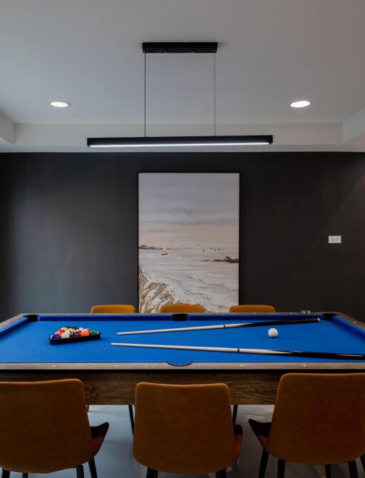 Modern game room with pool table